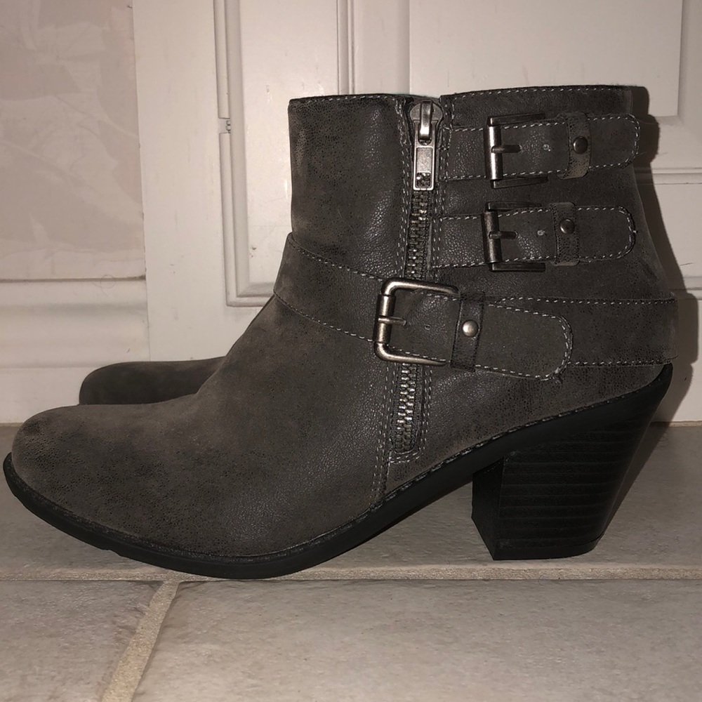 Grey short booties with silver buckles and zippers